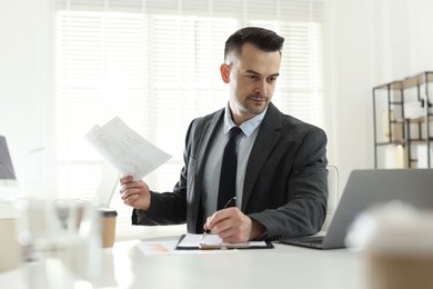 Photo of Marketing. Man working at desk in office