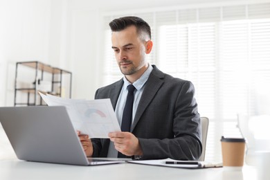 Photo of Marketing. Man working at desk in office