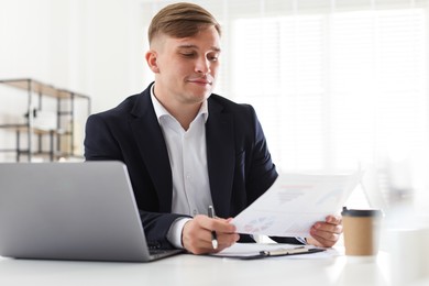 Photo of Marketing. Man working at desk in office