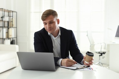 Photo of Marketing. Man working at desk in office