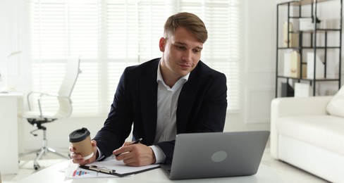 Photo of Marketing. Man working at desk in office