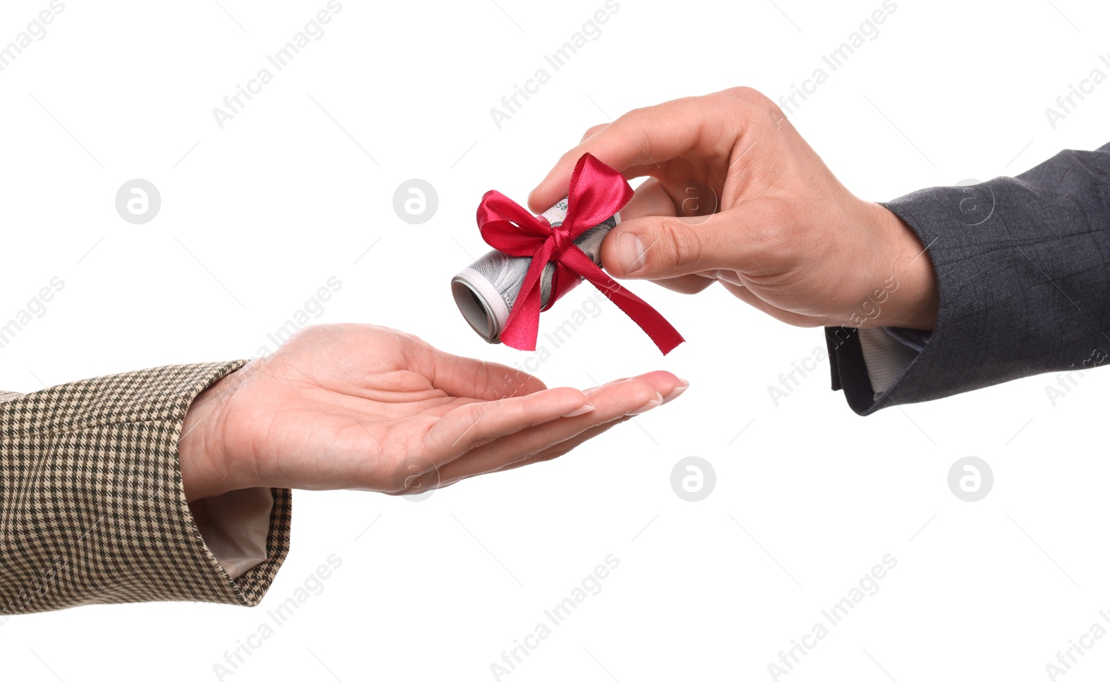 Photo of Bonus. Boss giving money to employee on white background, closeup