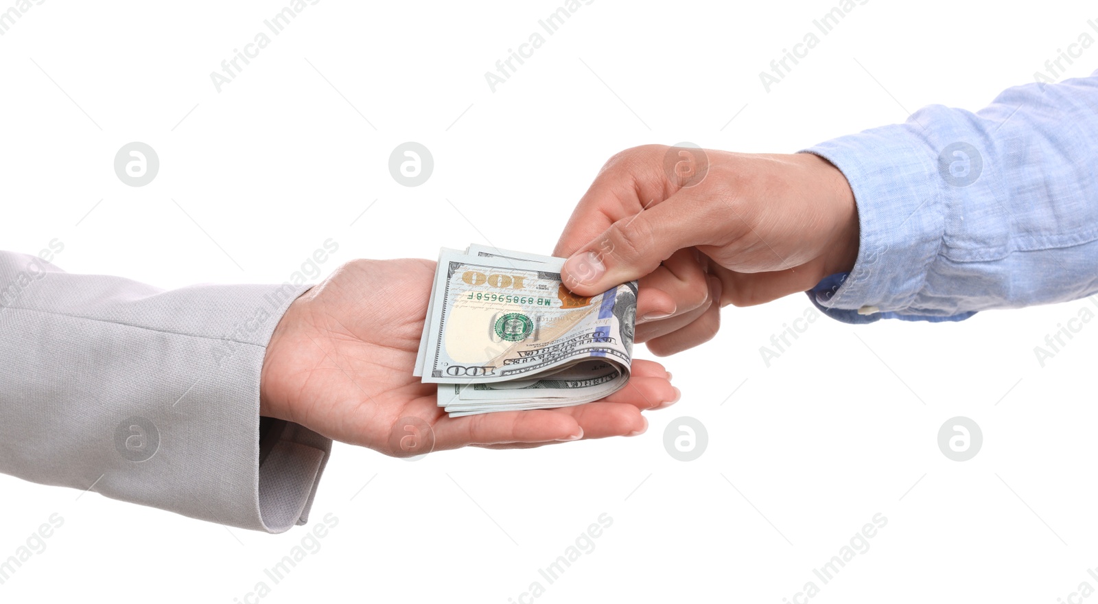 Photo of Bonus. Boss giving money to employee on white background, closeup