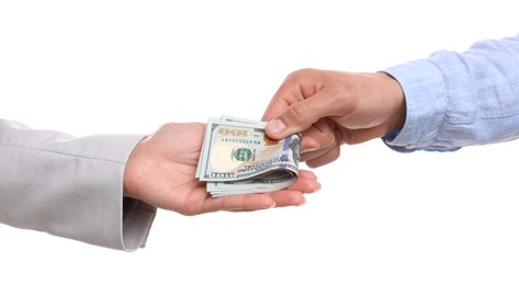 Photo of Bonus. Boss giving money to employee on white background, closeup