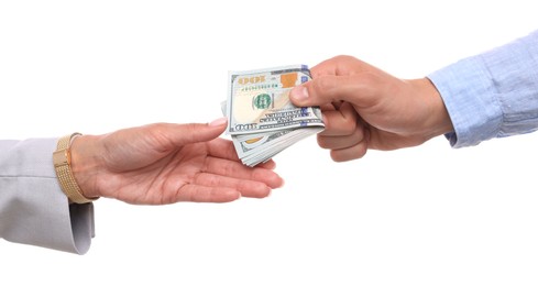 Photo of Bonus. Boss giving money to employee on white background, closeup