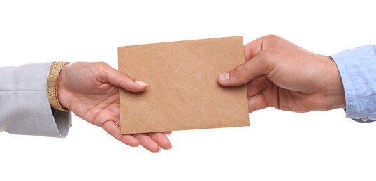 Photo of Money bonus. Boss giving envelope to employee on white background, closeup