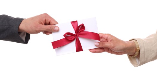 Photo of Money bonus. Boss giving envelope with bow to employee on white background, closeup