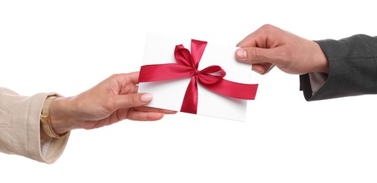Photo of Money bonus. Boss giving envelope with bow to employee on white background, closeup