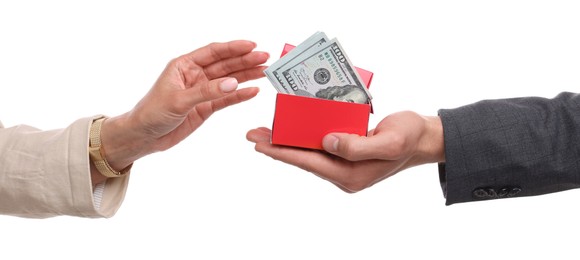 Photo of Bonus. Boss giving box with money to employee on white background, closeup