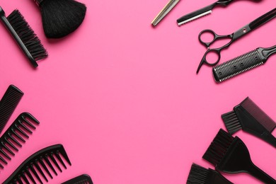 Photo of Frame of different hairdresser's tools on pink background, flat lay. Space for text