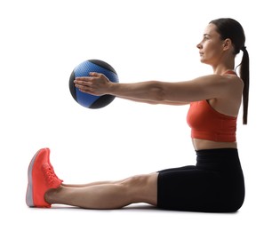 Photo of Athletic woman exercising with medicine ball on white background
