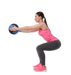 Photo of Athletic woman exercising with medicine ball on white background