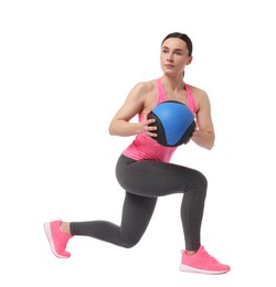 Photo of Athletic woman exercising with medicine ball on white background