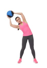 Photo of Athletic woman exercising with medicine ball on white background