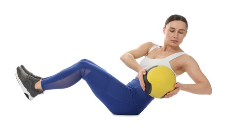 Photo of Athletic woman exercising with medicine ball on white background