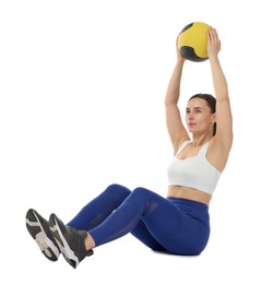 Photo of Athletic woman exercising with medicine ball on white background