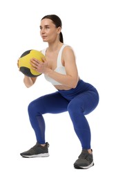 Photo of Athletic woman exercising with medicine ball on white background