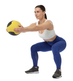 Photo of Athletic woman exercising with medicine ball on white background