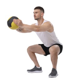 Photo of Man exercising with medicine ball on white background