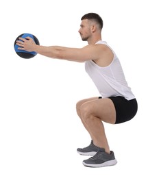 Photo of Man exercising with medicine ball on white background