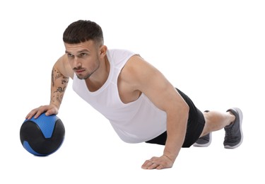 Photo of Man exercising with medicine ball on white background