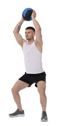 Photo of Man exercising with medicine ball on white background