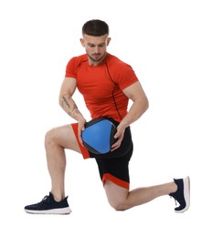 Photo of Man exercising with medicine ball on white background