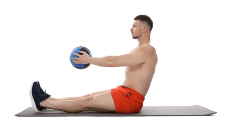 Photo of Man exercising with medicine ball on white background