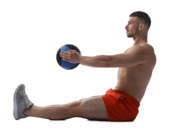 Photo of Man exercising with medicine ball on white background