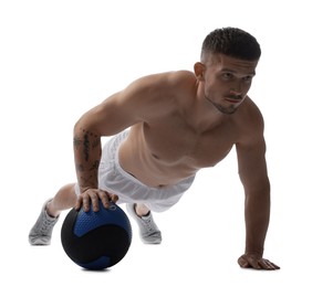 Photo of Man exercising with medicine ball on white background