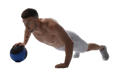 Photo of Man exercising with medicine ball on white background