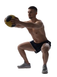 Photo of Man exercising with medicine ball on white background
