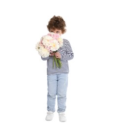 Photo of Cute little boy with bouquet of beautiful peonies on white background