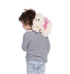 Photo of Cute little boy with bouquet of beautiful peonies on white background, back view