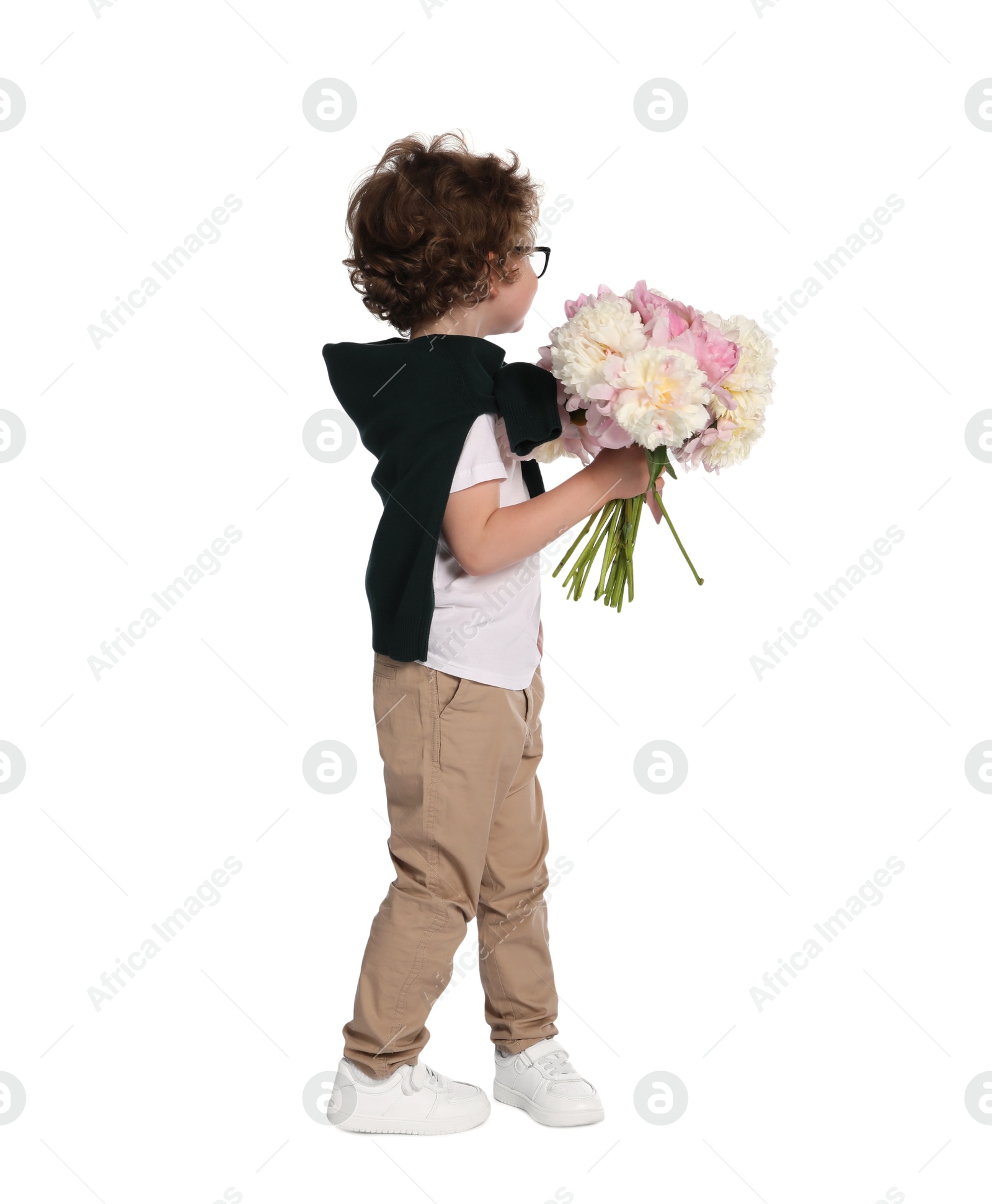 Cute little boy with bouquet of beautiful peonies on white background Photo of Cute little boy with bouquet of beautiful peonies on white background