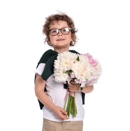 Photo of Cute little boy with bouquet of beautiful peonies on white background