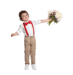 Photo of Cute little boy with bouquet of beautiful peonies on white background