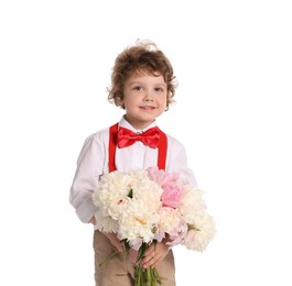 Photo of Cute little boy with bouquet of beautiful peonies on white background