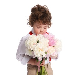 Photo of Cute little boy with bouquet of beautiful peonies on white background