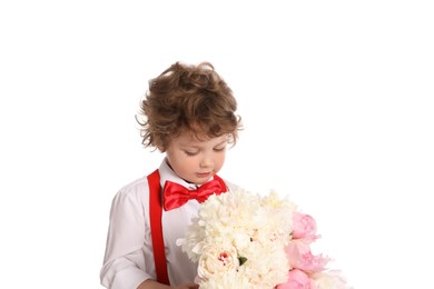 Photo of Cute little boy with bouquet of beautiful peonies on white background