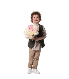 Photo of Cute little boy with bouquet of beautiful peonies on white background