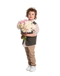 Photo of Cute little boy with bouquet of beautiful peonies on white background