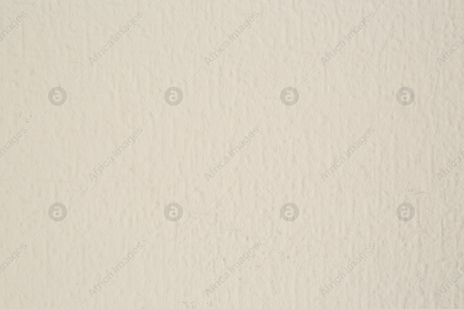 Beige textured surface as background, closeup view Photo of Beige textured surface as background, closeup view