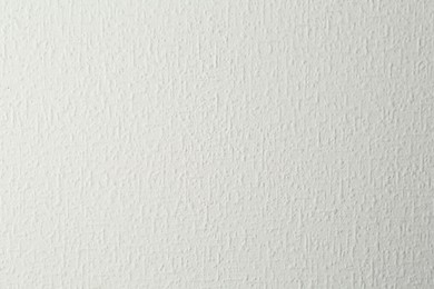 Photo of White textured surface as background, closeup view