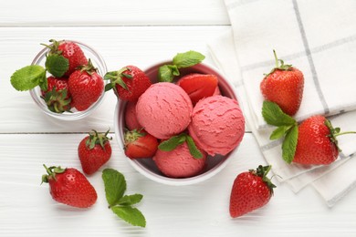 Photo of Tasty sorbet with strawberries and mint served on white wooden table, flat lay