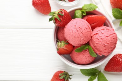 Photo of Tasty sorbet with strawberries and mint served on white wooden table, flat lay. Space for text