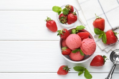 Photo of Tasty sorbet with strawberries and mint served on white wooden table, flat lay. Space for text