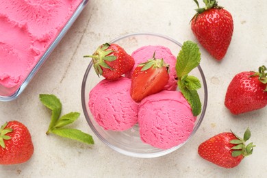 Photo of Tasty sorbet with strawberries and mint served on light table, flat lay