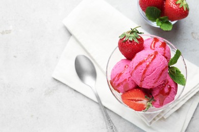 Photo of Tasty sorbet with strawberries and mint served on light table, flat lay. Space for text