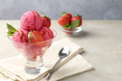 Photo of Tasty sorbet with strawberries and mint served on light table, closeup. Space for text